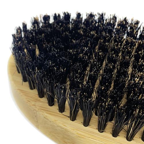 Close up of the bristles in the Kobe Palm Military Brush