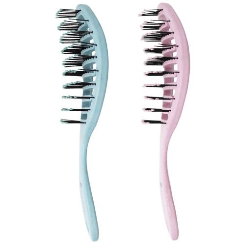 The ergonomic shape of the Kumi Wheat Vent Brush keeps the massaging pins in touch with the scalp