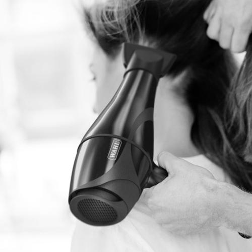 The Wahl Pro Keratin Dryer has a keratin-infused tourmaline grill to lock in moisture for long-lasting shine.