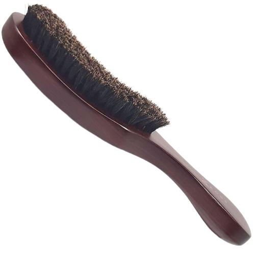 The shaped bristles of the Kobe Errol Club Brush follow the contours of the head when brushing.