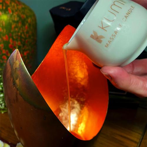 Once the Kumi Massage Candle has melted enough, simply pour out the oil to use for a sumptuous massage.