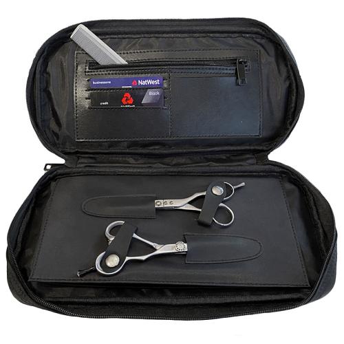 The detachable bottom part of the CoolBlades Scissor & Tool Case has 2 boards with loops for 2 scissors on each.