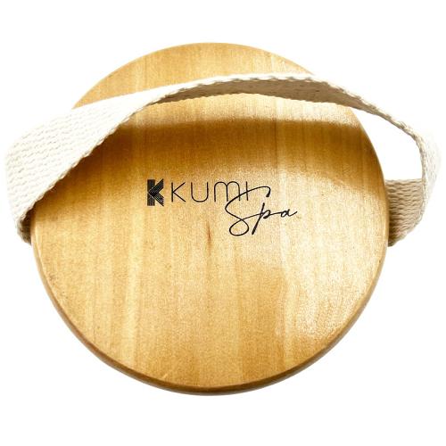 The Kumi Spa Massaging Body Brush has a natural wooden body and hessian hand strap.