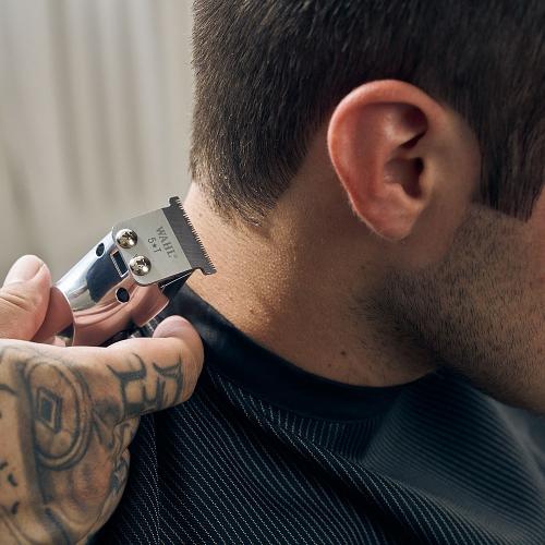 Wahl A Line Trimmer in use on male head side