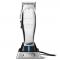 Andis Master Cordless hair clipper on its charging stand