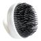 Rows of black plastic pins on the Kobe Wike Massage Brush gently massage the head and help to spread shampoo into the hair.
